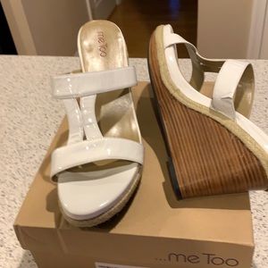 White patent sandal. Wedged 3 1/2 heel slight worn